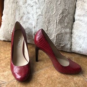 Kors red leather high heeled pumps